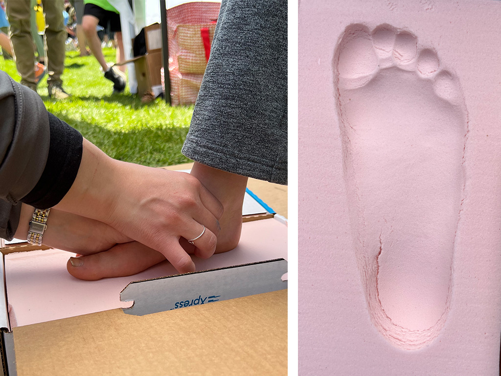 A foot mold is made by a youth participant for later foot shape data scanning.