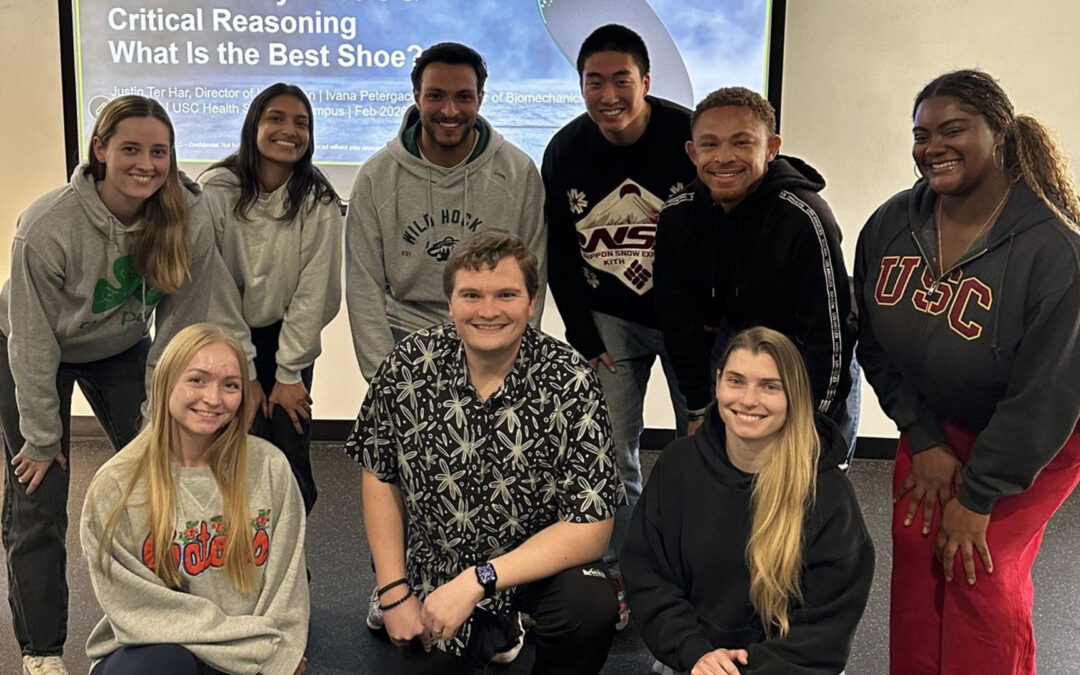 INSITE Director of Innovation Justin Ter Har, MSc (bottom center) and footwear biomechanics manager Ivana Petragacova (bottom right) pose with USC students during Justin’s guest lecture on footwear sciences.